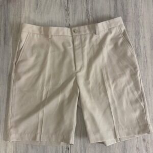 Greg Norman Mens Beige Performance Golf Shorts Size 38 Flat Front Shark Logo